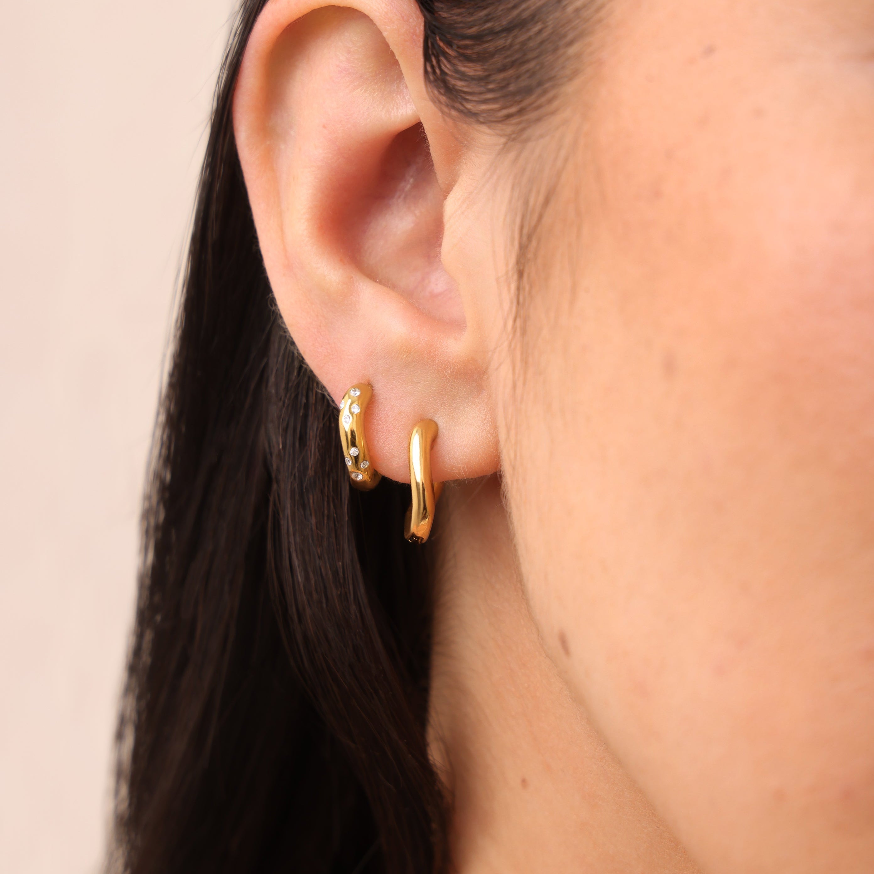 gold wave huggie hoop earrings stack