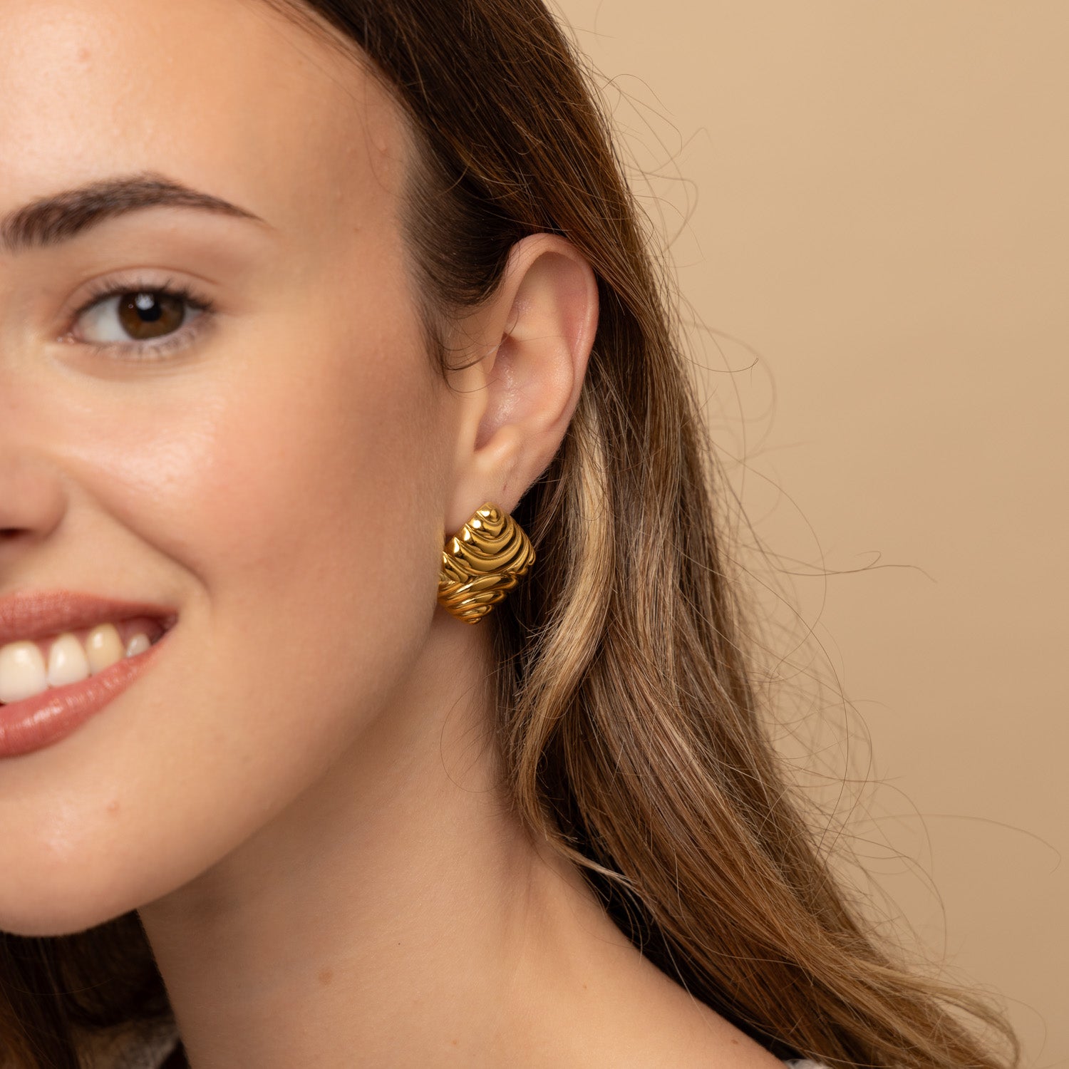 Gold chunky stud earrings
