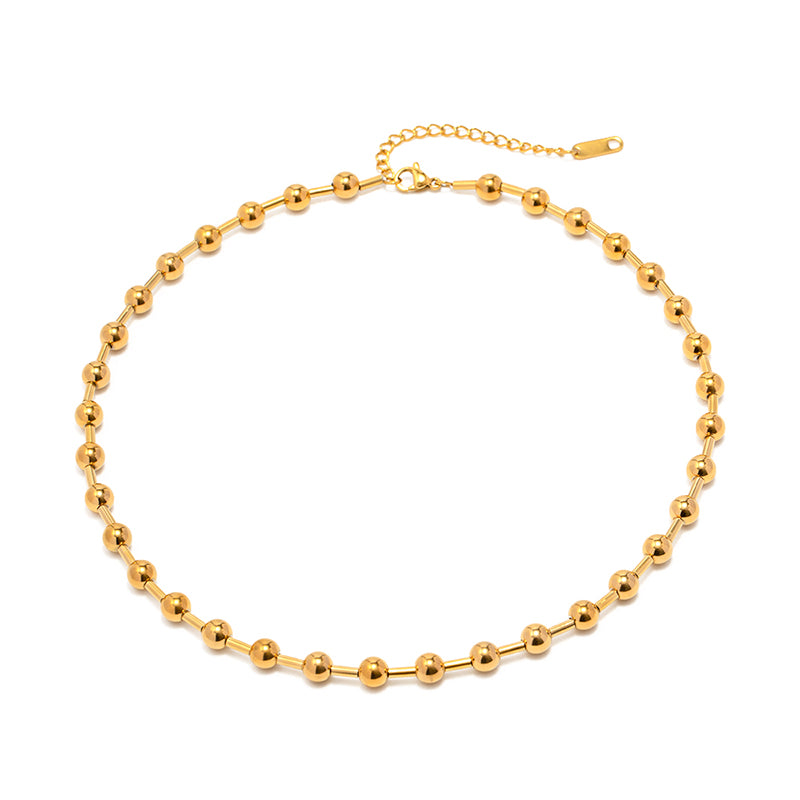 A gold chunky ball chain necklace with a lobster clasp closure.