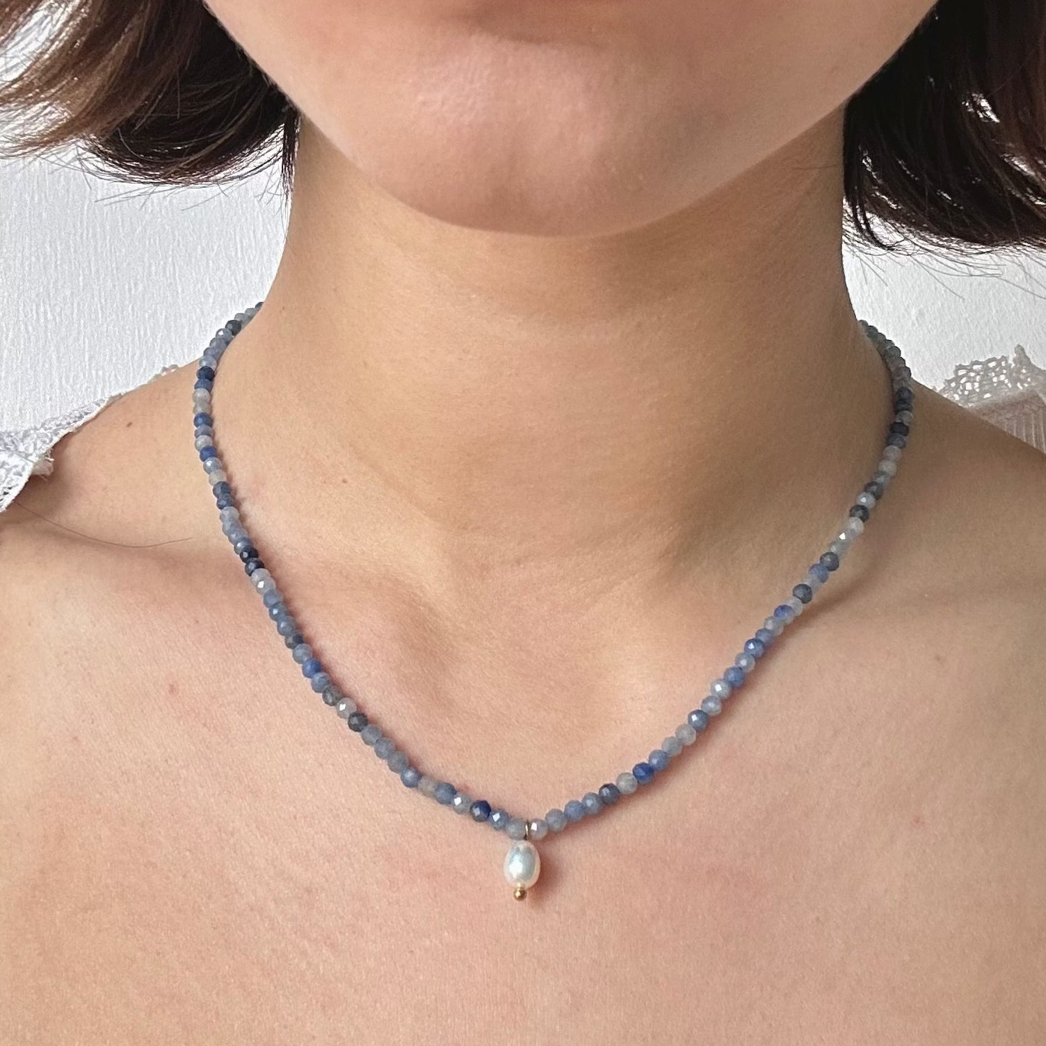 Semi precious stones and pearl necklace