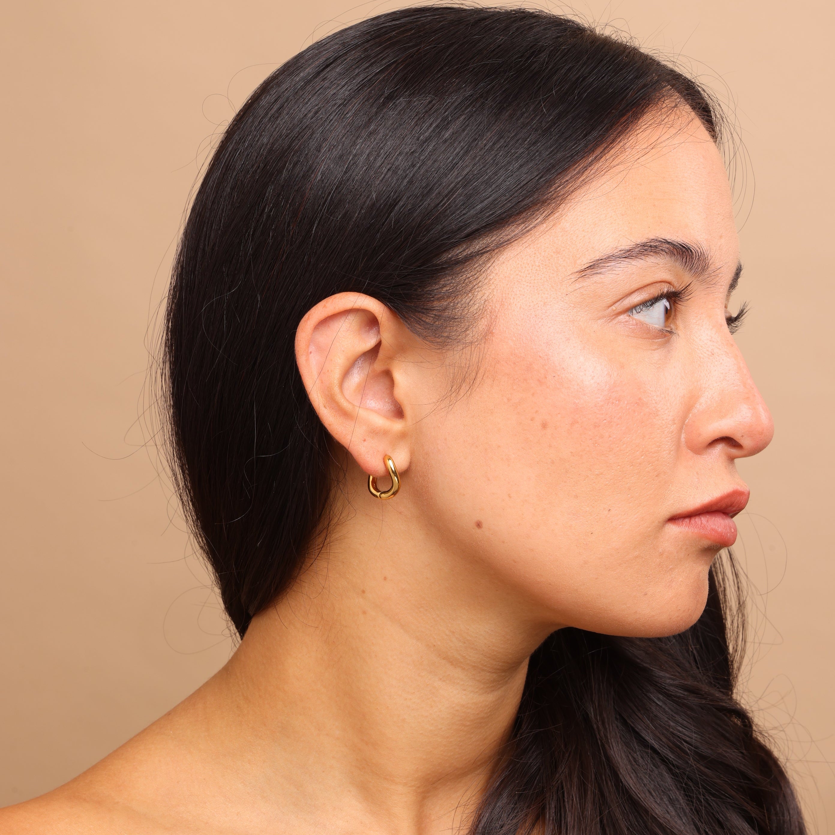 Gold wave huggie hoop earrings β modern wave design, waterproof and anti-tarnish