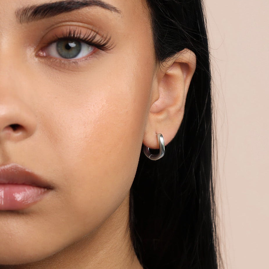 waterproof silver wave huggie hoop earrings