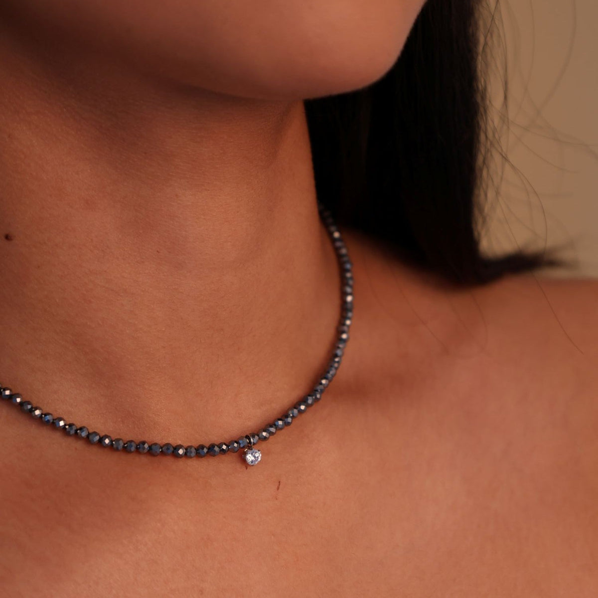Grey beaded gemstone necklace in silver