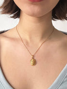 gold croissant pendant necklace