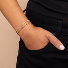 gold clear tennis bracelet styled with multicolur tennis bracelet