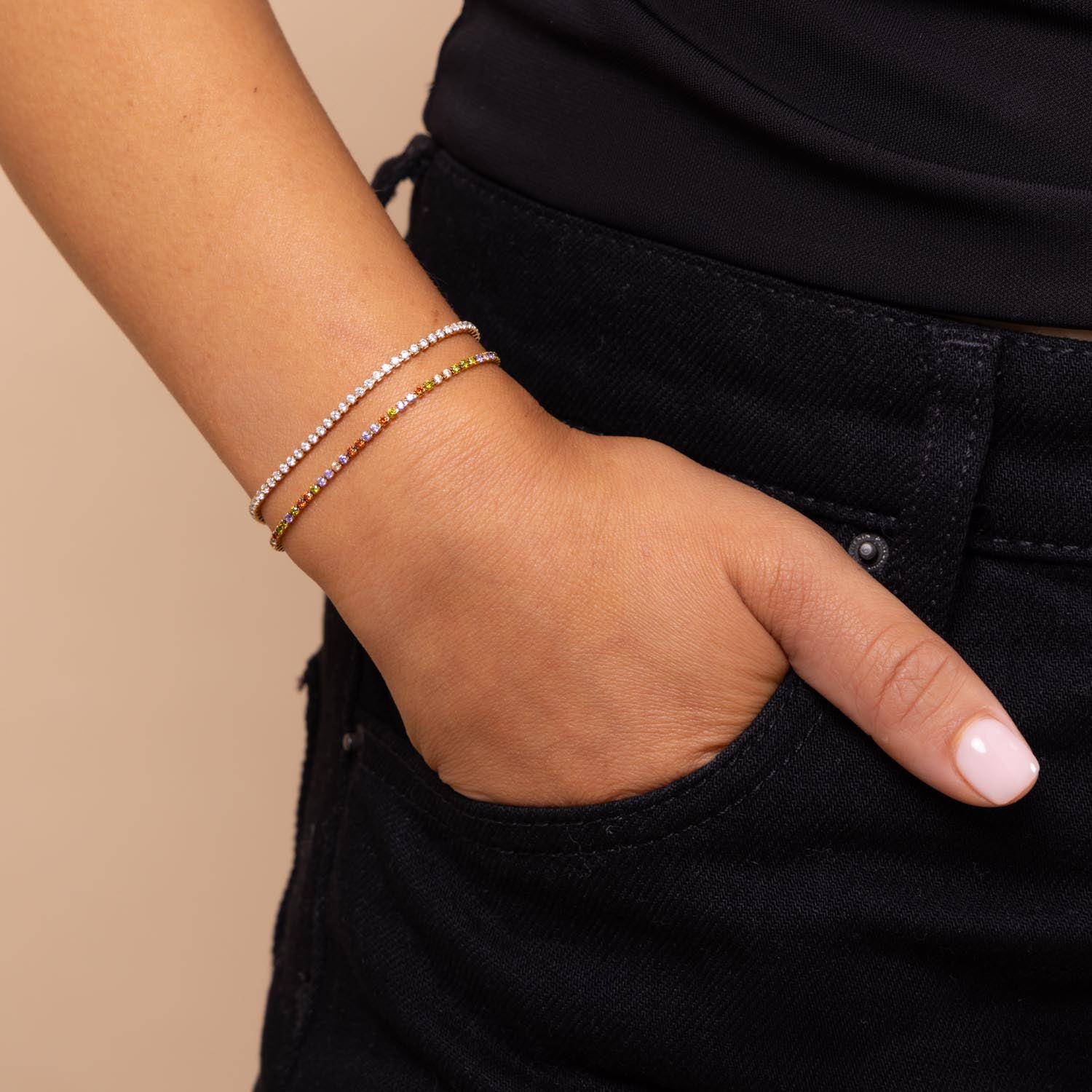 gold clear tennis bracelet styled with multicolur tennis bracelet