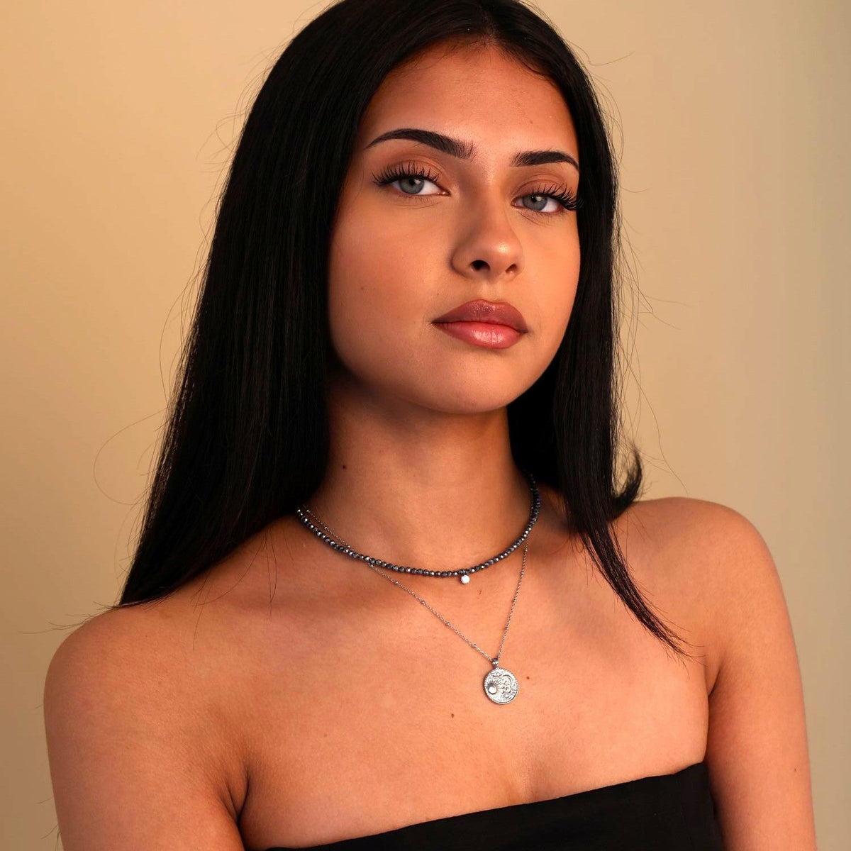 grey gemstone necklace with cubic zirconia stone detail