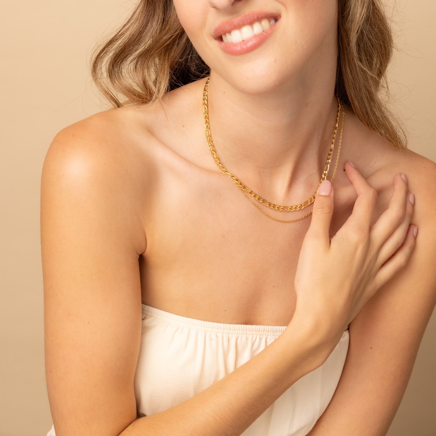 gold figaro chain necklace