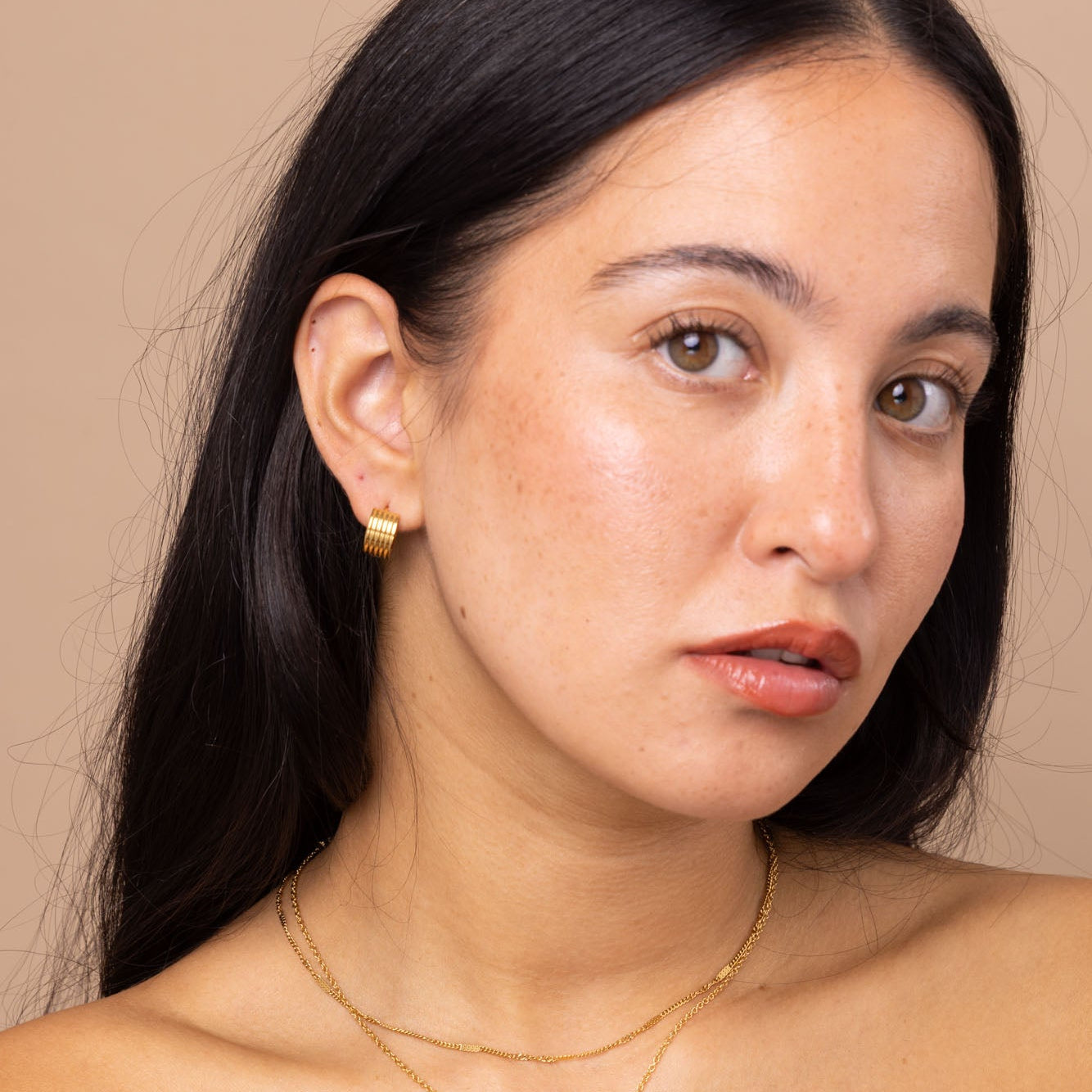 gold chunky huggie hoop earrings