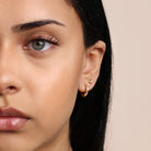 anti tarnish gold earring stack side view