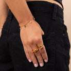 Rainbow Charm Bracelet with multi-coloured crystals styled with gold adjustable rings – playful waterproof anti-tarnish jewellery.