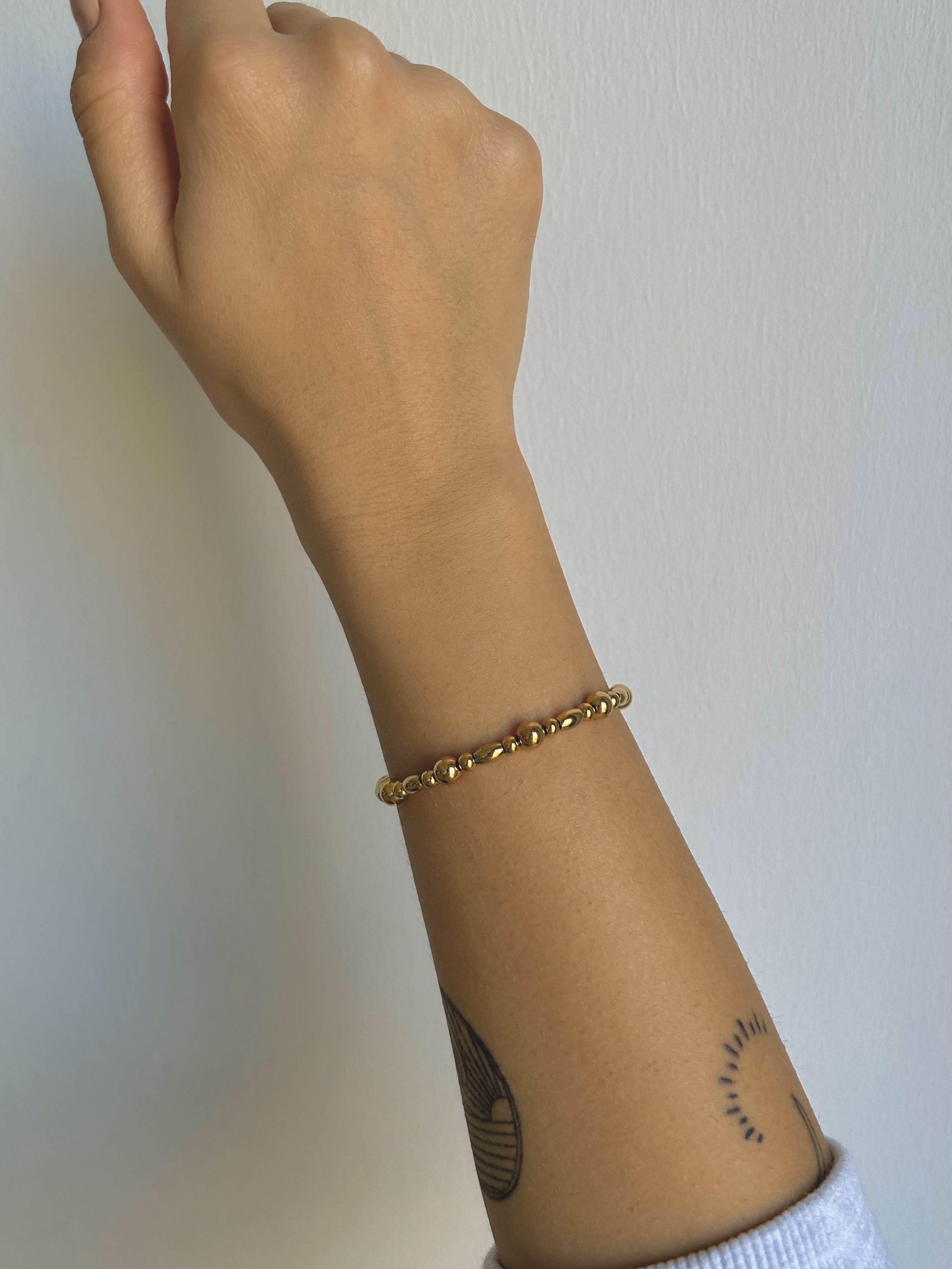 gold large bead bracelet