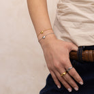 silver and gold dainty heart bracelet stack