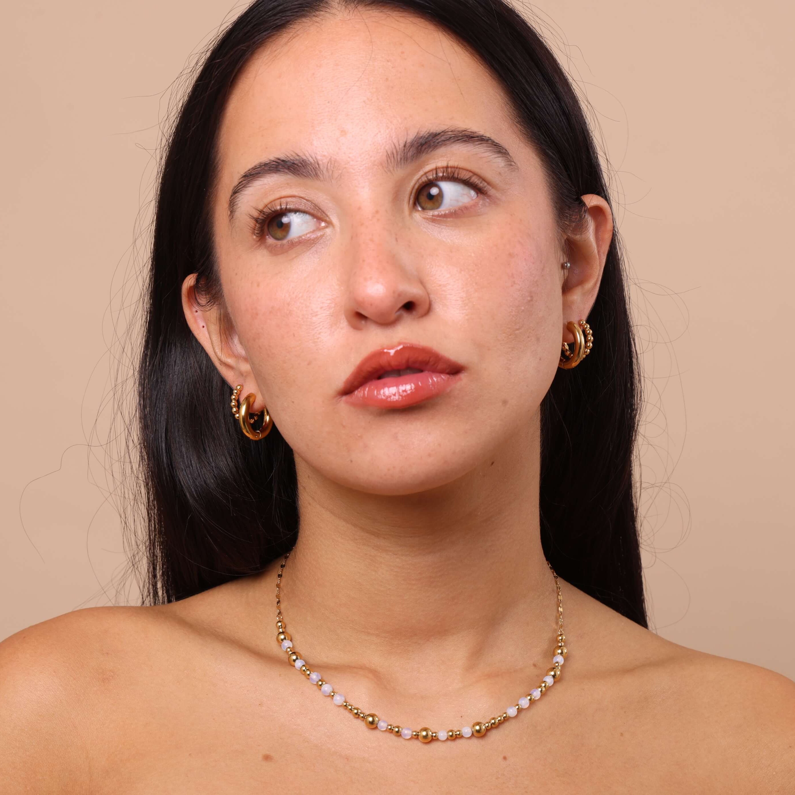 Close-up of Moonstone and Gold Beaded Chunky Necklace paired with star earrings – gold chunky beaded design with moonstone, waterproof and tarnish-free.
