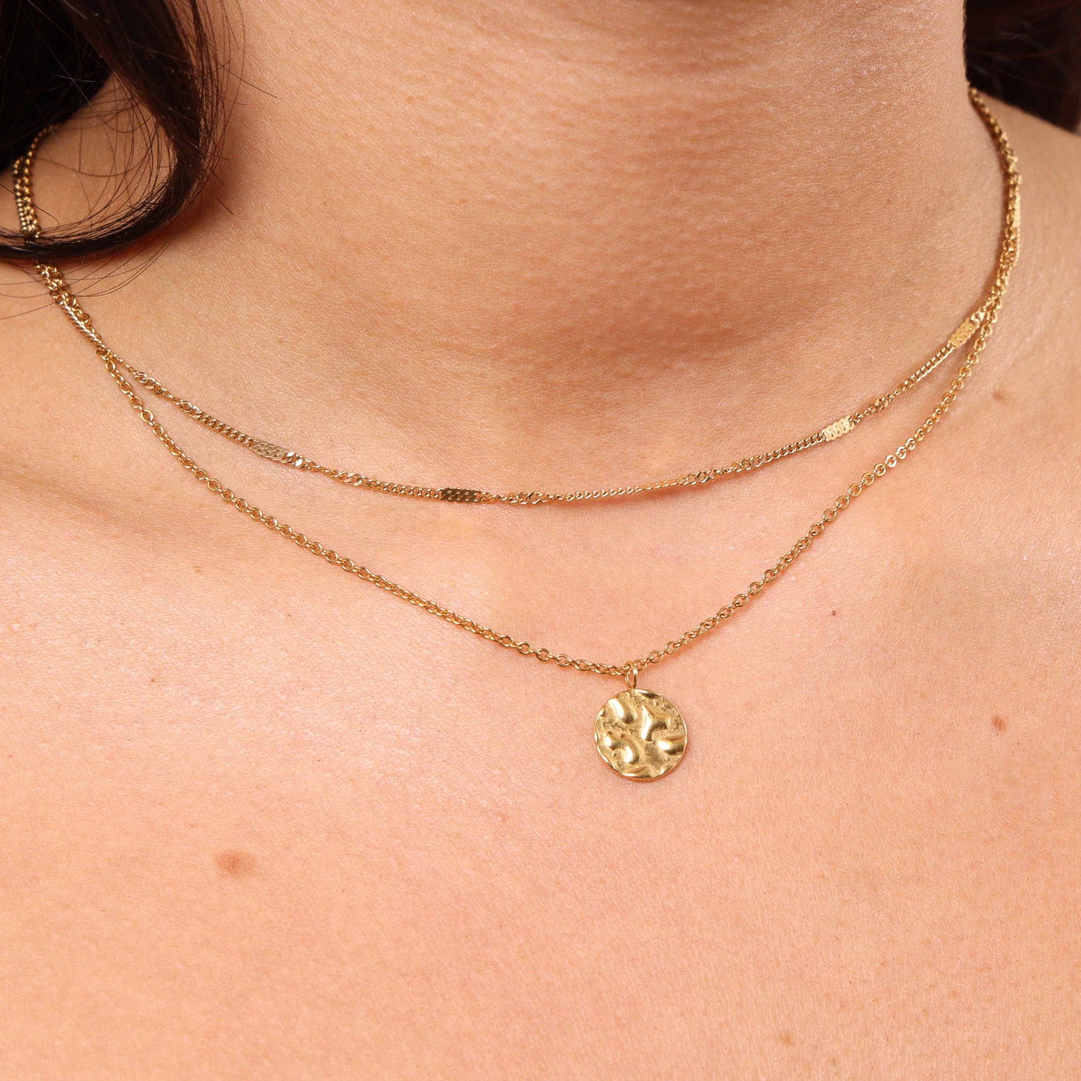 Small Round Textured Pendant Necklace layered with a thin chain – minimal dainty waterproof anti-tarnish jewellery for everyday wear.