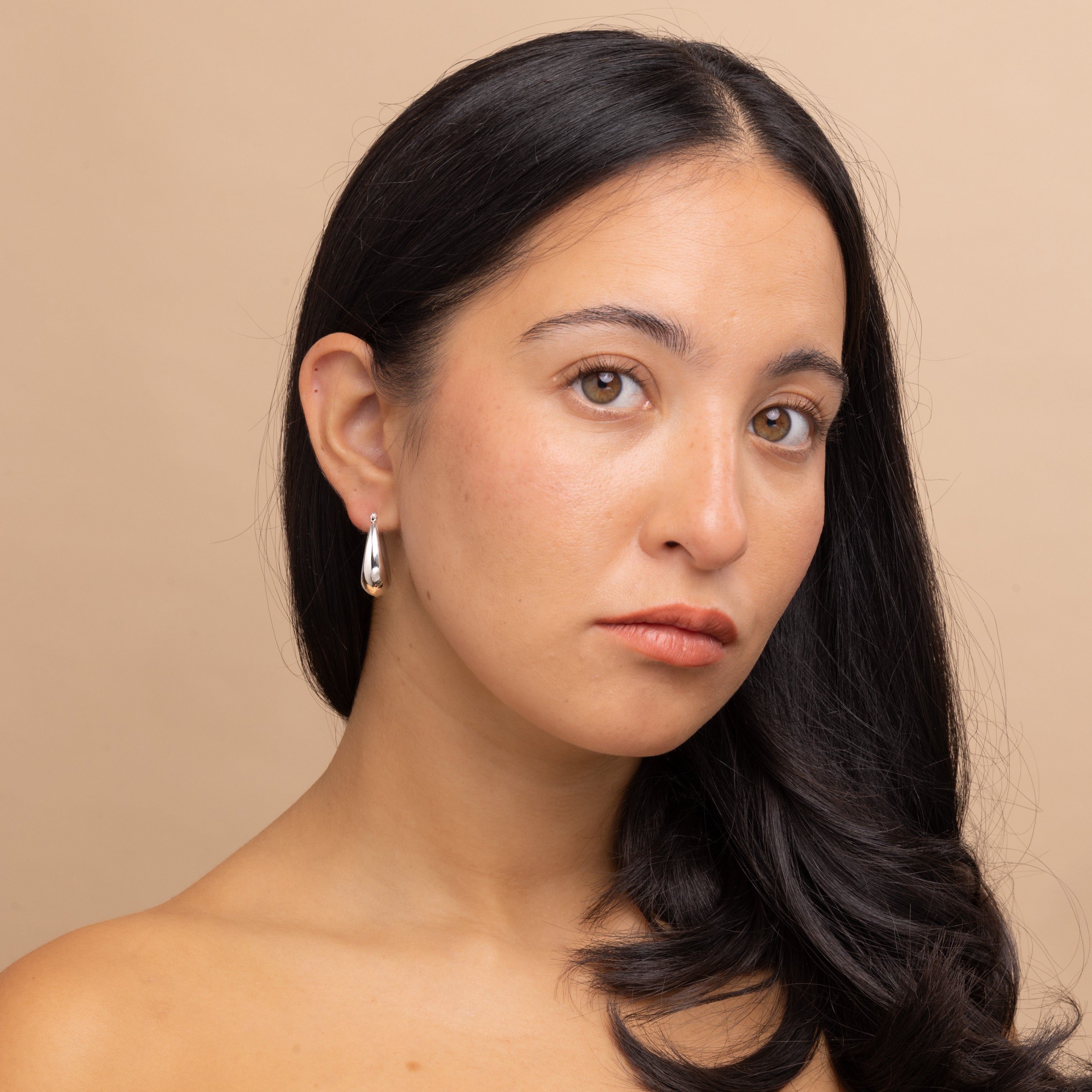 Silver Thick Oval Hoop Earrings by Zoi Era – bestselling waterproof oval hoop earrings in stainless steel with sleek silver finish, versatile chunky design.