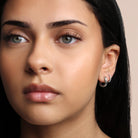 anti tarnish silver wave huggie hoop earrings